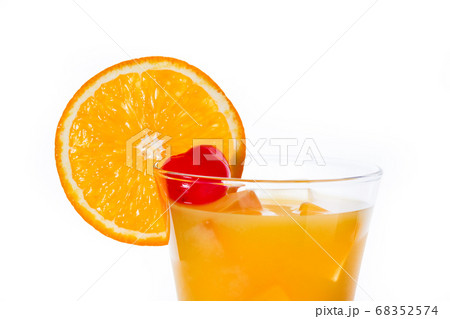 Tequila sunrise cocktail in glass isolated on white background Tequila sunrise cocktail in glass isolated on white background 68352574