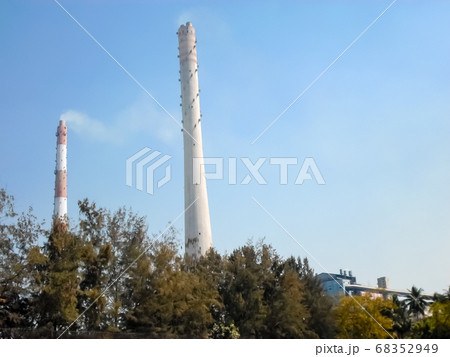 Factory chimney emits smoke, industrial Factory chimney emits smoke, industrial 68352949