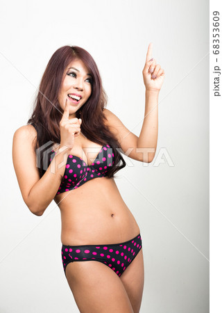 Portrait of young Asian woman wearing lingerie Portrait of young Asian woman wearing lingerie 68353609