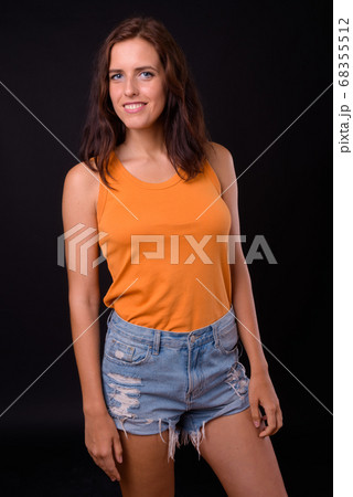 Portrait of happy young beautiful woman with brown hair 68355512