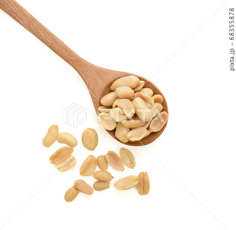 Peanuts in a Wooden spoon on white background, top view 68355878