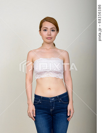 Portrait of young beautiful Asian woman in underwear as health concept Portrait of young beautiful Asian woman in underwear as health concept 68356386