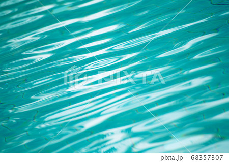 Hotel swimming pool with sunny reflections 68357307