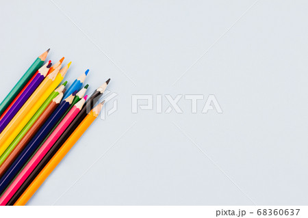 Pencils on a light blue background. 68360637