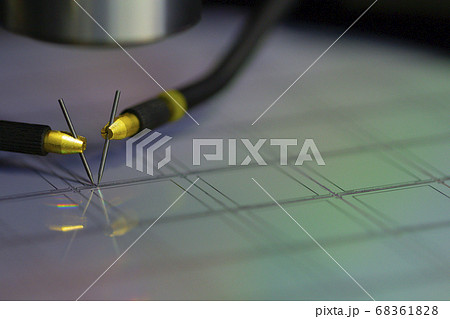 Manual probe system with needles for test of semiconductor on silicon wafer. Selective focus. Manual probe system with needles for test of semiconductor on silicon wafer. Selective focus. 68361828