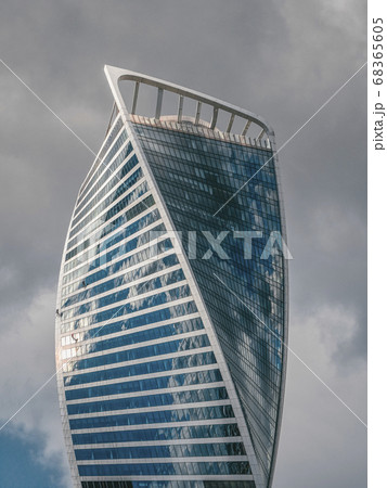 Modern high-rise building made of glass Modern high-rise building made of glass 68365605
