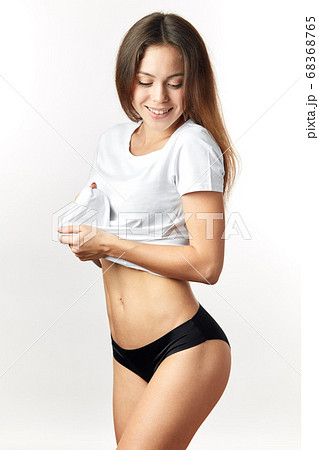 pretty girl demonstrating her underwear - Stock Photo [68368765] - PIXTA