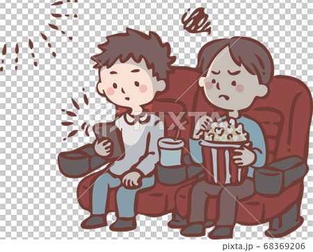 A man watching a smartphone during a movie screening A man watching a smartphone during a movie screening 68369206