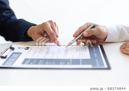 Business people hold resume documents, interviews for the work experience of young men applying as financial accountants for the company, Job interview and Job application Concept. 68374844