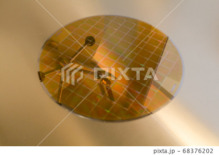 Silicon Wafer inside of glovebox on steel surface 68376202