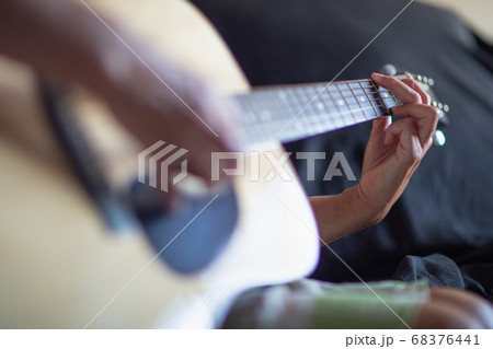Woman Playing Guitar Abstract Woman Playing Guitar Abstract 68376441
