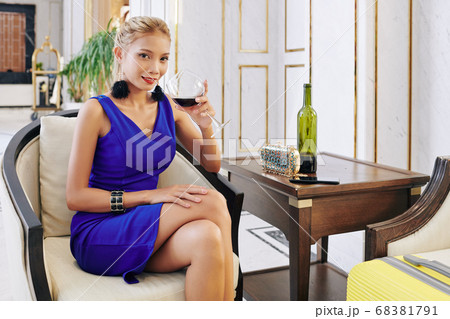 Woman drinking red wine Woman drinking red wine 68381791