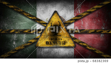 Coronavirus COVID-19 outbreak. Worn Yellow Biohazard, danger, warning sign over flag of Mexico 68382369