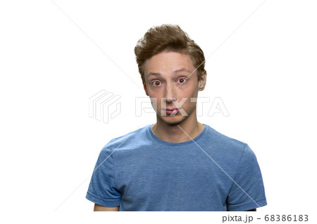 Portrait of teen boy wearing blue t-shirt. 68386183