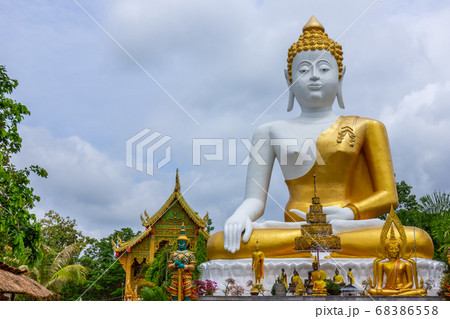 Big Buddha at Wat Phra That Doi Kham, Chiang Mai, Thailand Big Buddha at Wat Phra That Doi Kham, Chiang Mai, Thailand 68386558