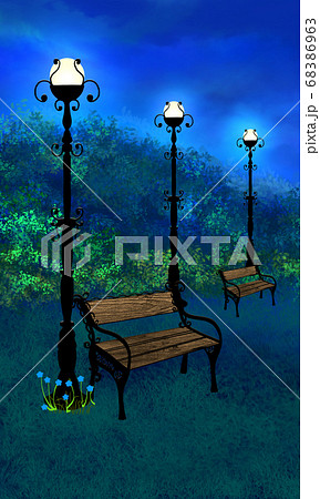Two benches and night lights in the evening park 68386963