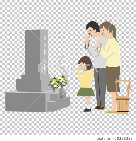 Family visiting the grave 68388382