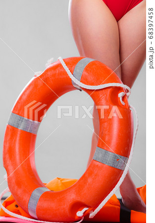 Life buoy ring and female legs 68397458