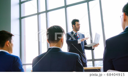 Group of business people meeting in a seminar conference Group of business people meeting in a seminar conference 68404915