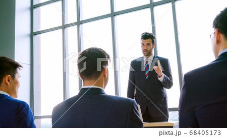 Group of business people meeting in a seminar conference Group of business people meeting in a seminar conference 68405173
