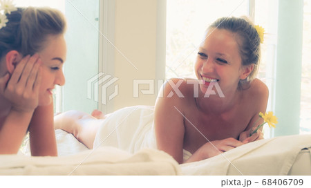 Two women at massage room in luxury day spa. 68406709
