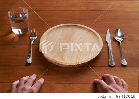 Point of view of a person about to eat on an empty 68417019