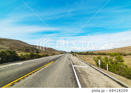 Straight country road in California 68418209