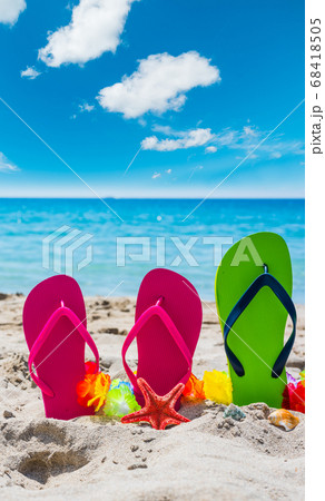 Flip flops on the beach Flip flops on the beach 68418505
