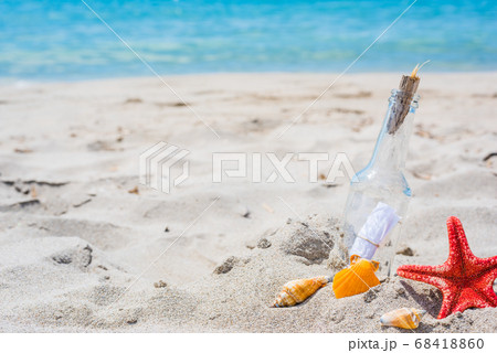 bottle on the beach 68418860