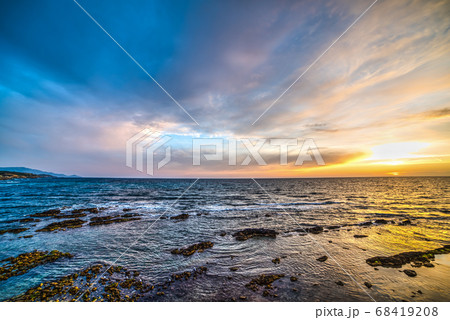 Dramatic sky over Alghero at sunset 68419208