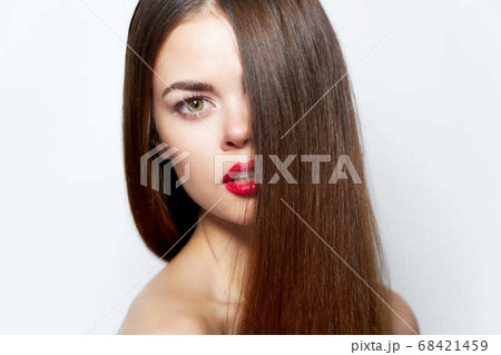 Brunette Attractive look red lips bared shoulders clear skin Brunette Attractive look red lips bared shoulders clear skin 68421459
