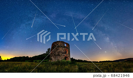 Meteor Shower and the Milky Way with old ruin 68421946