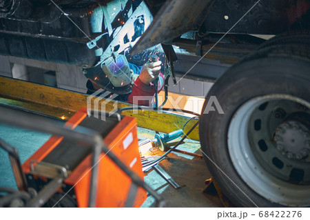 Close up of welder doing danger work 68422276