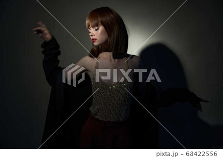 charming lady t-shirt with sequins dark isolated background charming lady t-shirt with sequins dark isolated background 68422556