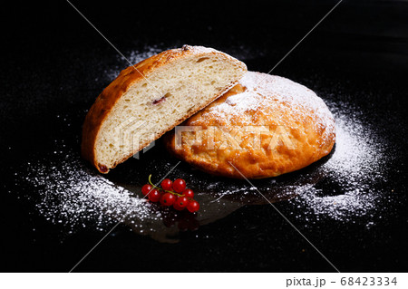 Sweet cupcake in round bread shape with filling. Photo in section. Sweet cupcake in round bread shape with filling. Photo in section. 68423334