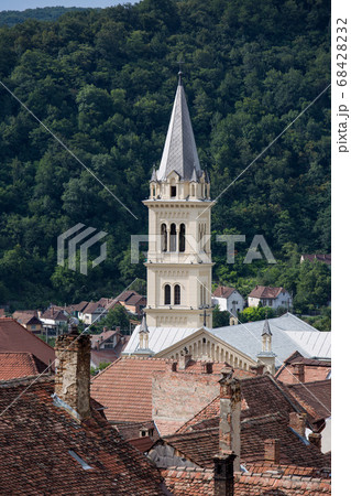 Aerial view on red tiled roofs of medieval Brasov town in Transylvania, Romania. Europe 68428232