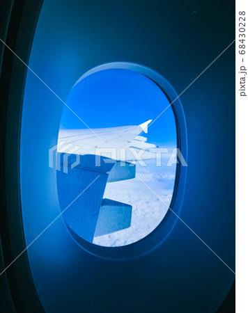 View from an airplane on a blue sky and white 68430228