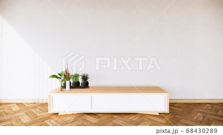 tropical room interior with cabinet and plants 68430289