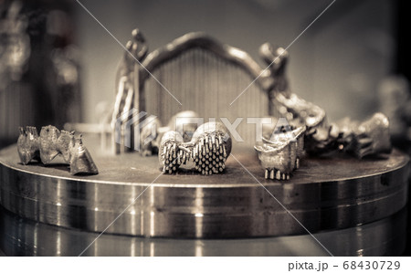 Object printed on metal 3d printer close-up. Object printed on metal 3d printer close-up. 68430729