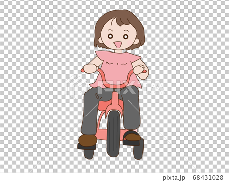 Toddler rowing a tricycle 68431028