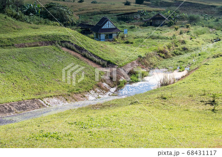Flowing water from the concrete spillway. Flowing water from the concrete spillway. 68431117