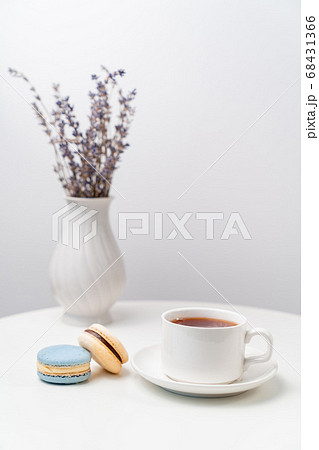 macarons on background Cup and vase with lavender. macarons on background Cup and vase with lavender. 68431366