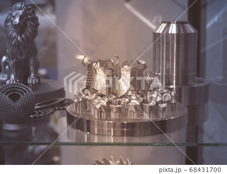 Object printed on metal 3d printer close-up Object printed on metal 3d printer close-up 68431700