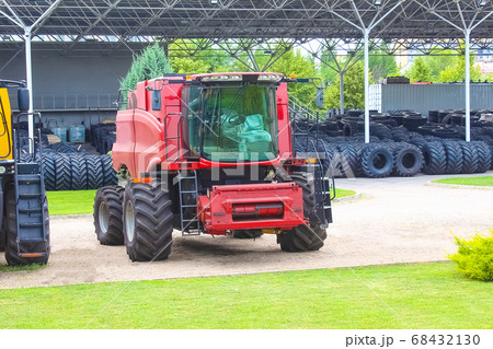 Modern combines at road at Kyiv Modern combines at road at Kyiv 68432130
