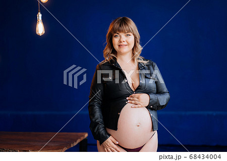 A Pregnant Woman Topless in Pajama Pants in Profile in a Home Interior.  Stock Image - Image of pants, attractive: 275364617