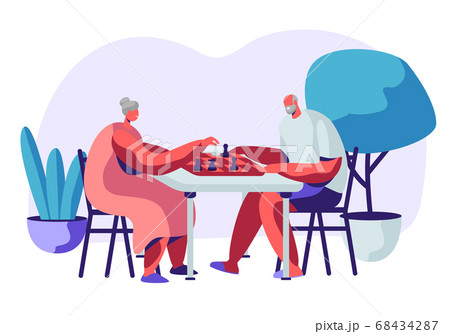 Relaxing Senior Man and Woman Playing Chess Relaxing Senior Man and Woman Playing Chess 68434287