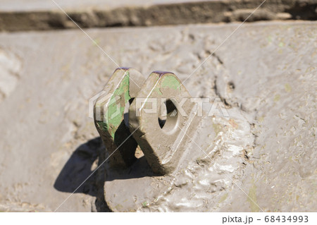 Detail of an old surface with exfoliated paint and rivets on military equipment. Military background 68434993
