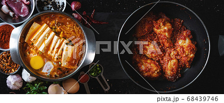 Kimchi Jjigae soup with Spicy fried chicken. Korean food Kimchi Jjigae soup with Spicy fried chicken. Korean food 68439746