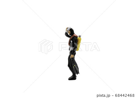 Miniature people : Scuba diver isolated on white background with clipping path Miniature people : Scuba diver isolated on white background with clipping path 68442468