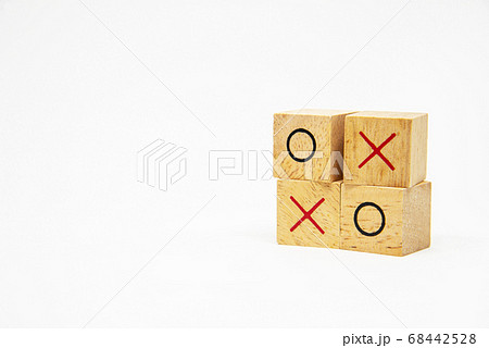 Side view two layer of wooden square block with O and X character symbol isolated on white background for design concept 68442528